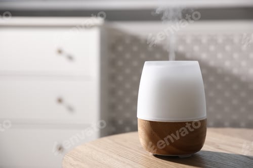 Preview: One stylish aroma lamp on wooden table indoors, closeup. Space for text