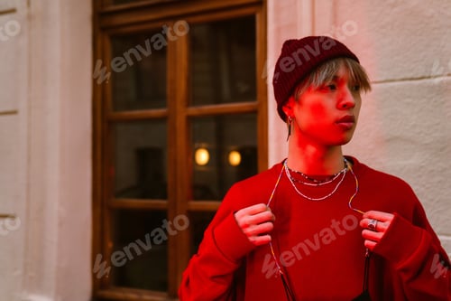 Preview: Asian boy standing with face mask using on street