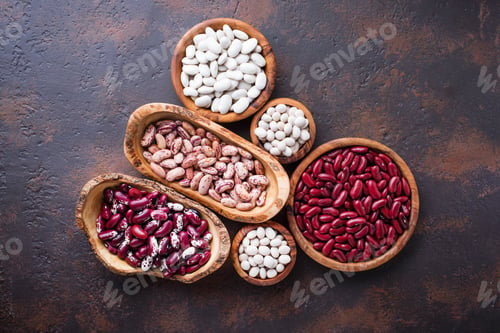 Preview: Assortment of various beans in wooden bowls
