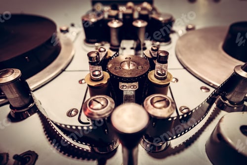 Preview: Metal parts of an old cinematographic machinery.