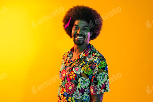 Preview: African man portrait in studio on colorful background
