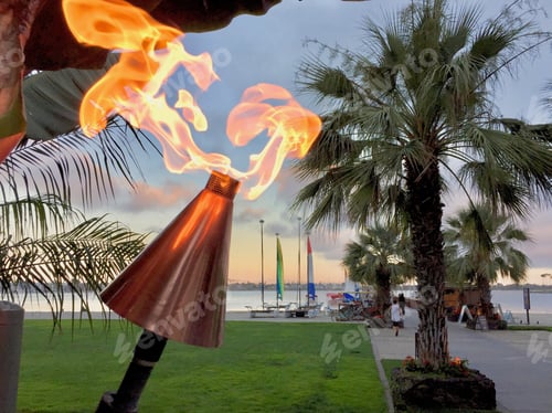 Preview: Dancing fire light at dusk on Mission Bay, San Diego California