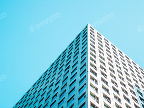 Preview: Highrise building against the blue sky