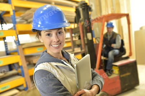 Preview: Smiling Woman Working In Warehouse