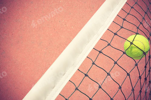 Preview: Tennis Ball In Net On Court Background Vintage Color