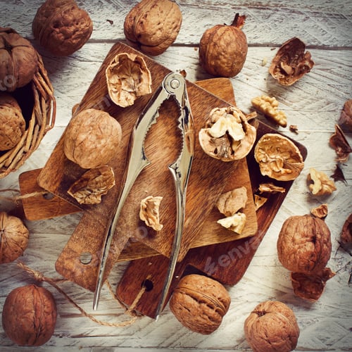 Preview: Fresh walnuts on an old wooden table