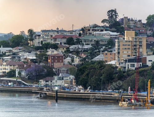 Preview: Buildings and the houses by the Brisbane River near the Port of Brisbane in Australia