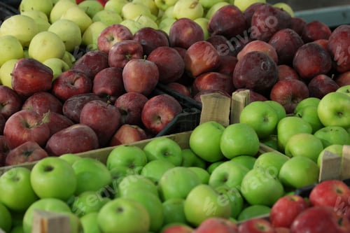 Preview: Organic fruits at market stall.