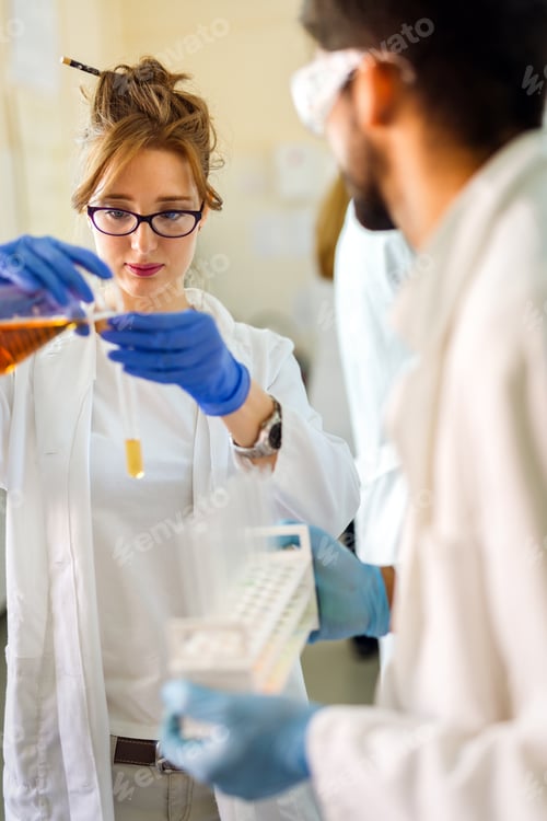 Preview: Group of medical scientists working at laboratory. Science, chemistry, medicine and people concept