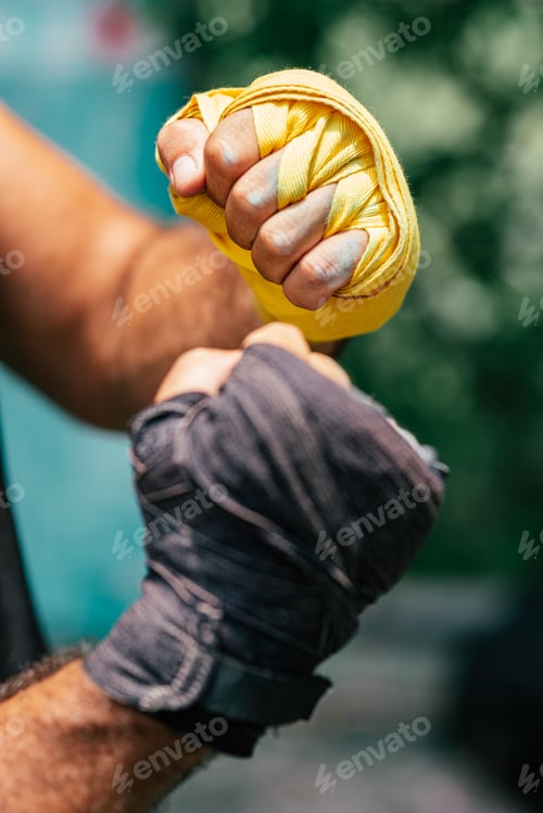 Preview: Strength. Close-up of the hands of a boxer