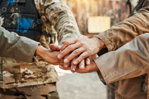 Preview: Paintball, team and hands together for meeting in motivation, huddle or game plan on the battle fie