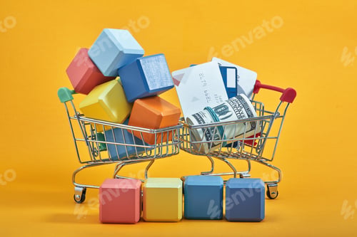 Preview: the concept of advertising. shopping cart with multi-colored cubes. it symbolizes a lot of purchases