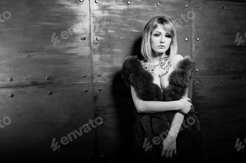 Preview: Studio portrait of blonde girl