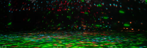 Preview: blurred rays of light on the disco floor. red green blue neon searchlight lights. laser lines and li