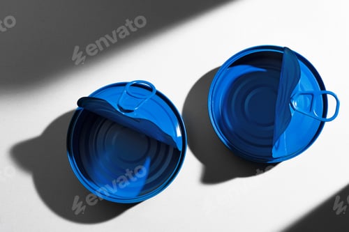 Preview: Painted blue opened tin can with ring on white background
