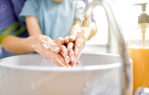 Preview: Kid and adult are washing their hands