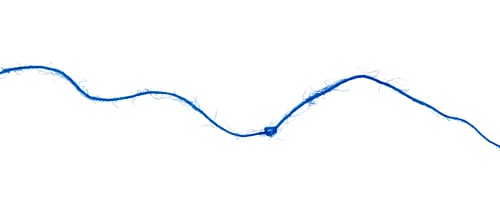 Preview: Threads on a white background. Selective focus.