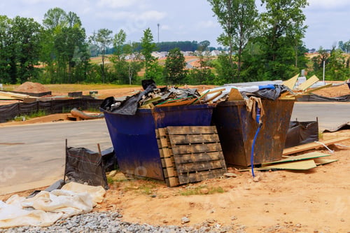 Preview: When house is being constructed, construction waste is disposed of using a garbage metal container
