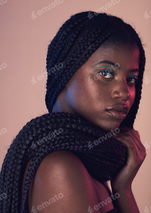Preview: Portrait, hair and makeup with a model black woman in studio on a wall background for natural hairc