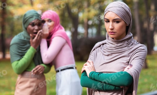 Preview: Bad Friends Talking About Unhappy Muslim Woman Standing Alone Outdoor