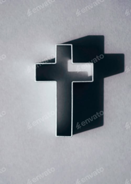 Preview: Silhouette of christian cross on grey background, soft bokeh lights background. Copy space. Church