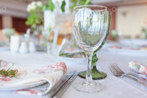 Preview: Empty glasses set in restaurant. Part of interior. Close-up