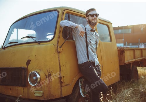 Preview: Portrait of a young handsome stylish man, wearing shirt and bow-