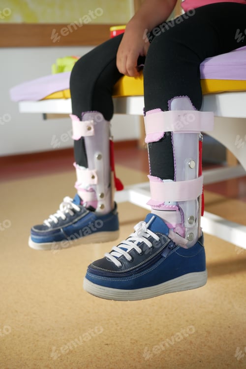 Preview: Child cerebral palsy disability, legs orthosis.