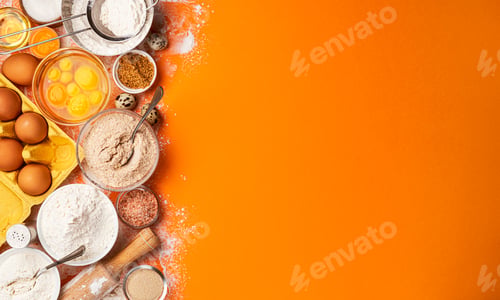 Preview: Baking ingredients on yellow color background, top view