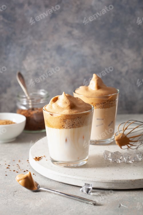 Preview: dalgona coffee in glass. trendy Instant coffee whipped with sugar and hot water