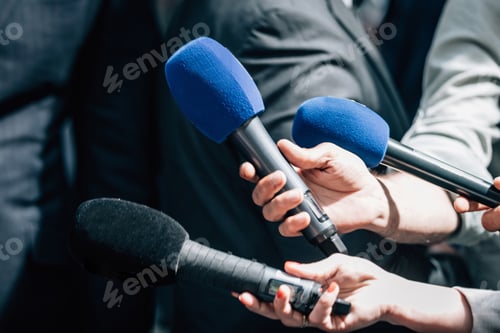 Preview: ews reporters holding microphones, taking an official statement