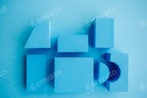 Preview: Geometrical figures still life composition. Cube and other objects on blue background.