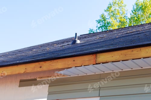 Preview: Aluminum fascia trim blown off damage exposed wood showing after hurricane a storm