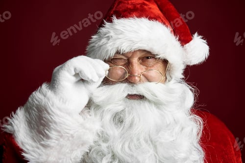 Preview: Cute Santa Claus winking the eye