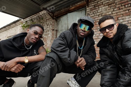 Preview: Posing Men in Urban Environment with Sunglasses and Chains