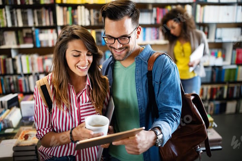 Preview: Young university students studying together. Group of multiracial friends in college
