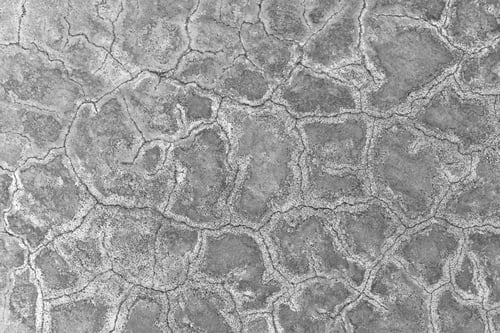 Preview: Dirty old cracked concrete floor texture background.