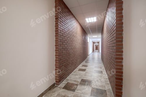Preview: white empty long corridor with red brick walls and doors in interior of modern apartments or office