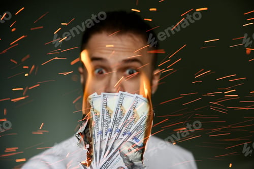 Preview: Person looking at the burning money