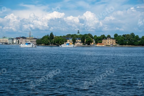 Preview: Travel to Sweden, Archipelago Stockholm. Panoramic view of city imposing building. Cruise ship sails