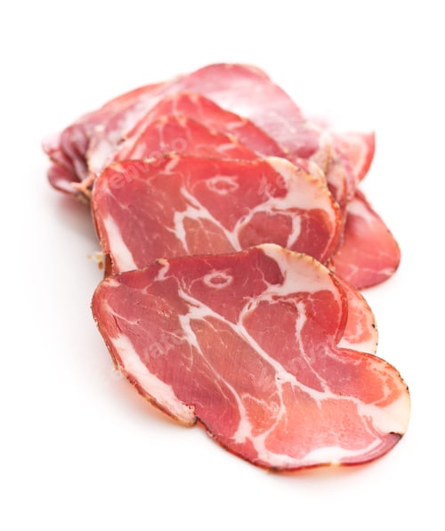 Preview: Slices of Cured Meat on White Background
