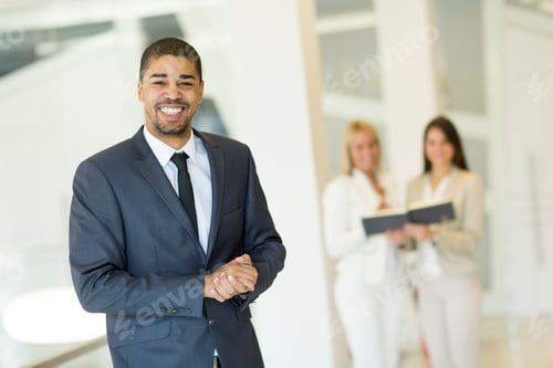 Preview: Young multiracial people working in the office