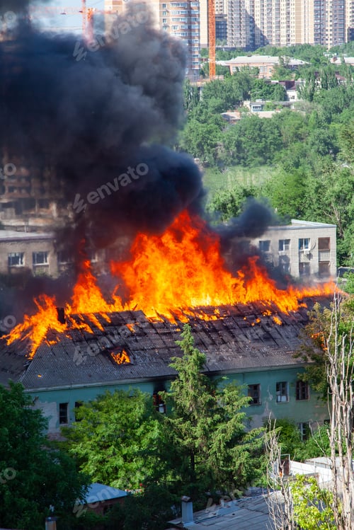Preview: A fire in an old abandoned house, a view from the window of a neighboring high-rise building.