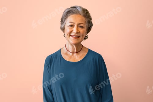 Preview: Senior Woman Smiling Brightly With Blue Top