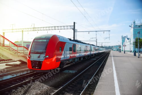 Preview: Modern high-speed train on the platform. Passenger red train at the station waiting
