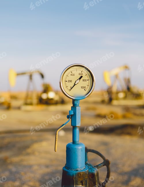 Preview: Air pressure gauge, oil rigs in background, Sunset-Midway oil fields, the largest in California.