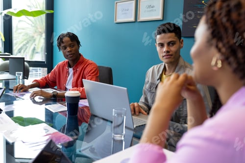 Preview: Business team discuss startup teamwork at a conference table in a modern office setting