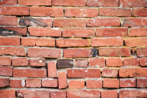 Preview: Red brick wall of old building, red brick texture, reliable brickwork masonry with bricklayer