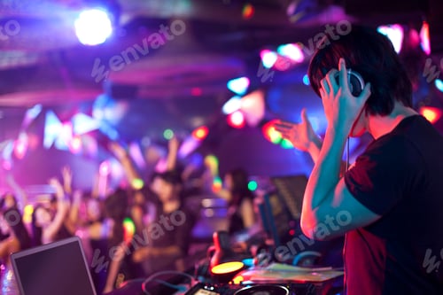 Preview: DJ doing record Scratching in nightclub