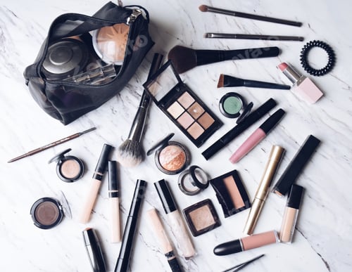 Preview: Cosmetics and beauty products on a marble countertop
